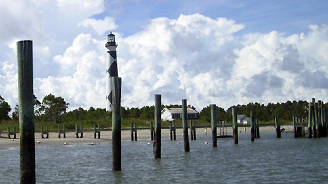 The Cape Lookout Lighthouse guards the second largest estuary in the U.S., the Albemarle-Pamlico Sound in North Carolina. Nearby areas that depend on the shellfish business face long-term economic risk from ocean acidification. (Photo: Chris J. Nicolini)