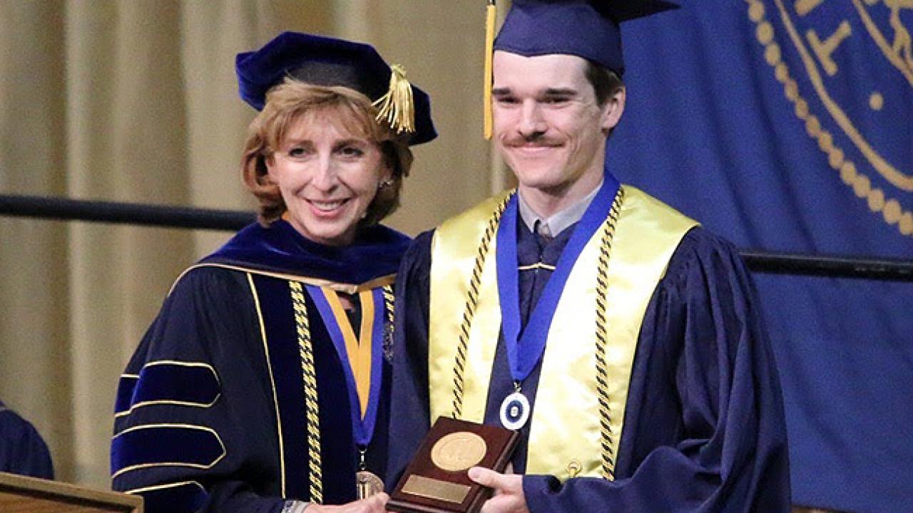 UC Davis Chancellor Linda P.B. Katehi presents the 2015 University Medal for excellence to CA&ES graduate Andrew Magee. (Photo by Chris Nicolini | UC Davis)