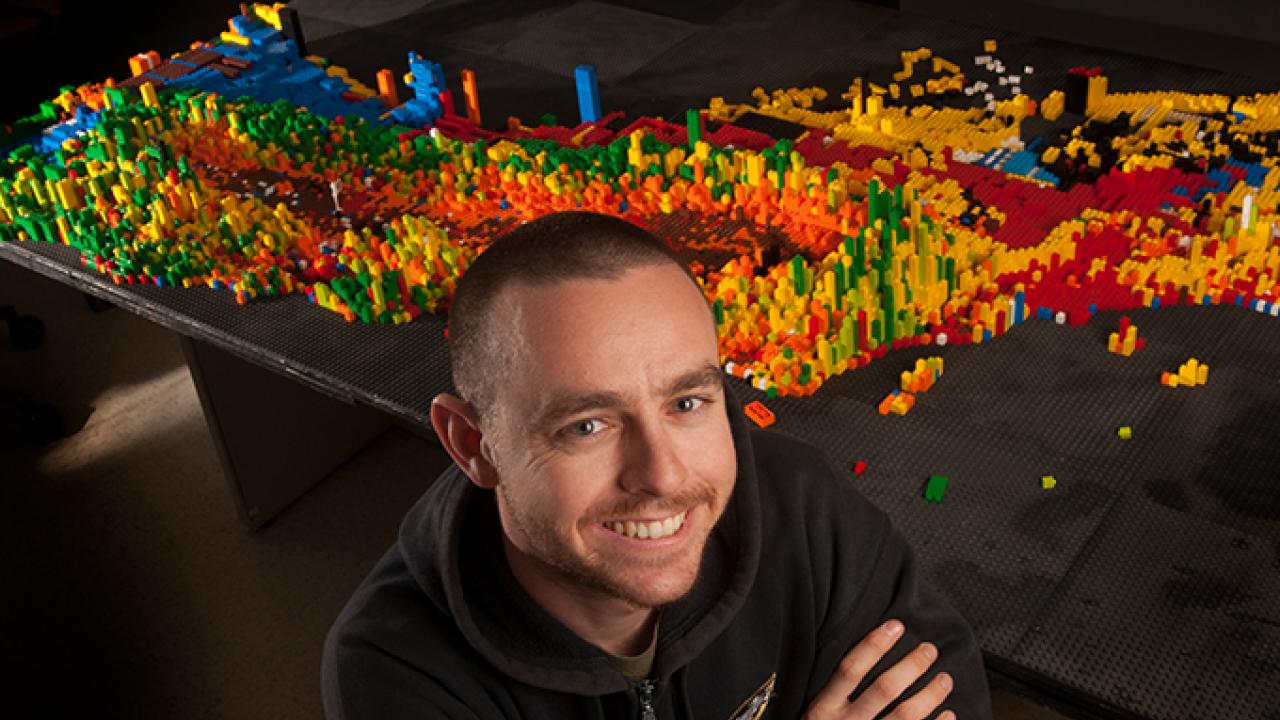Recent graduate Chris Zaleski is assembling a topographical Lego map of California. (Gregory Urquiaga/ UC Davis)
